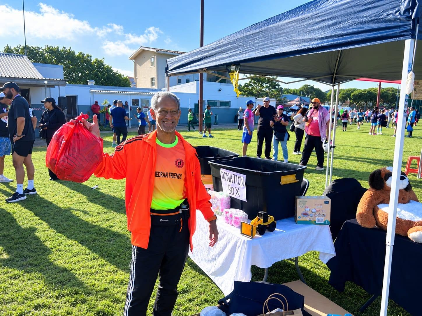 Community member donating at the Toy Run
